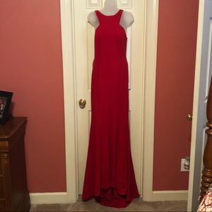 Xscape red backless gown